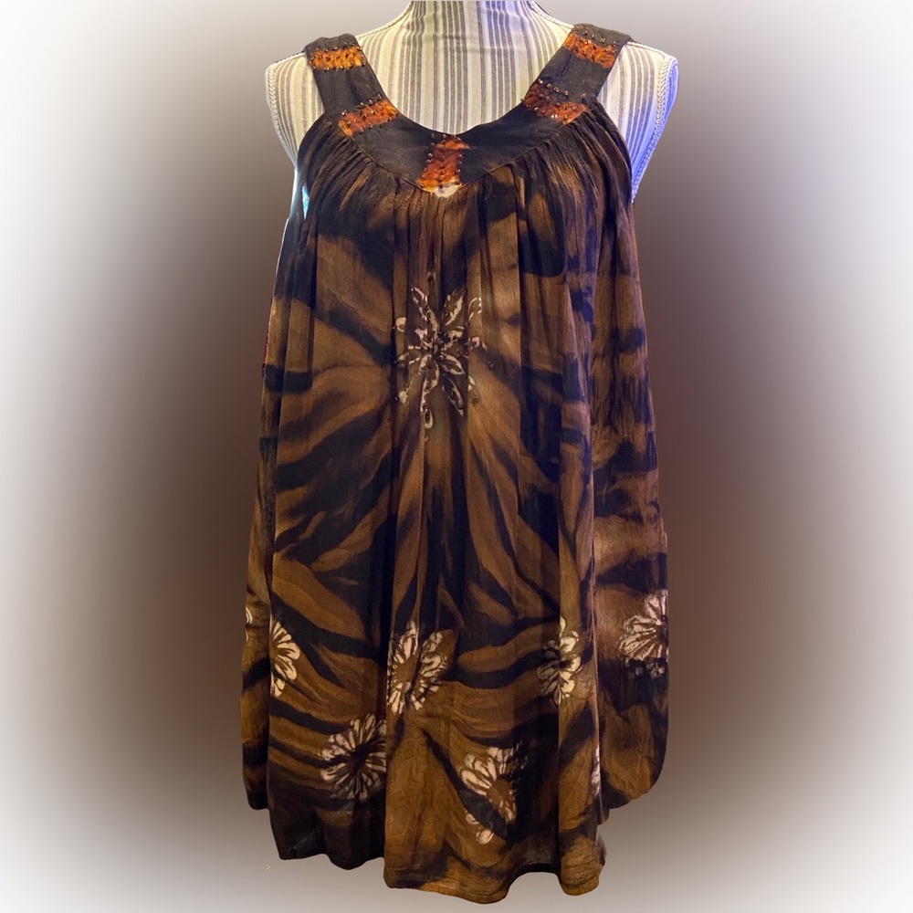 Beautiful flowing sleeveless dressy top.